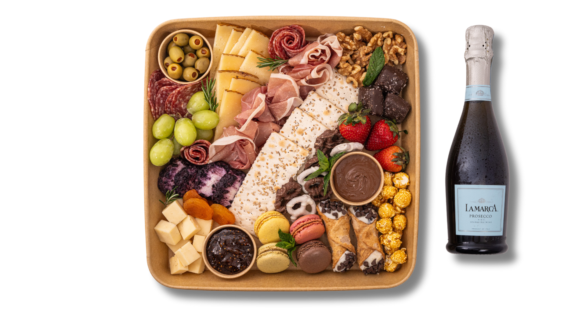 There is a bottle of champagne next to a tray of food.