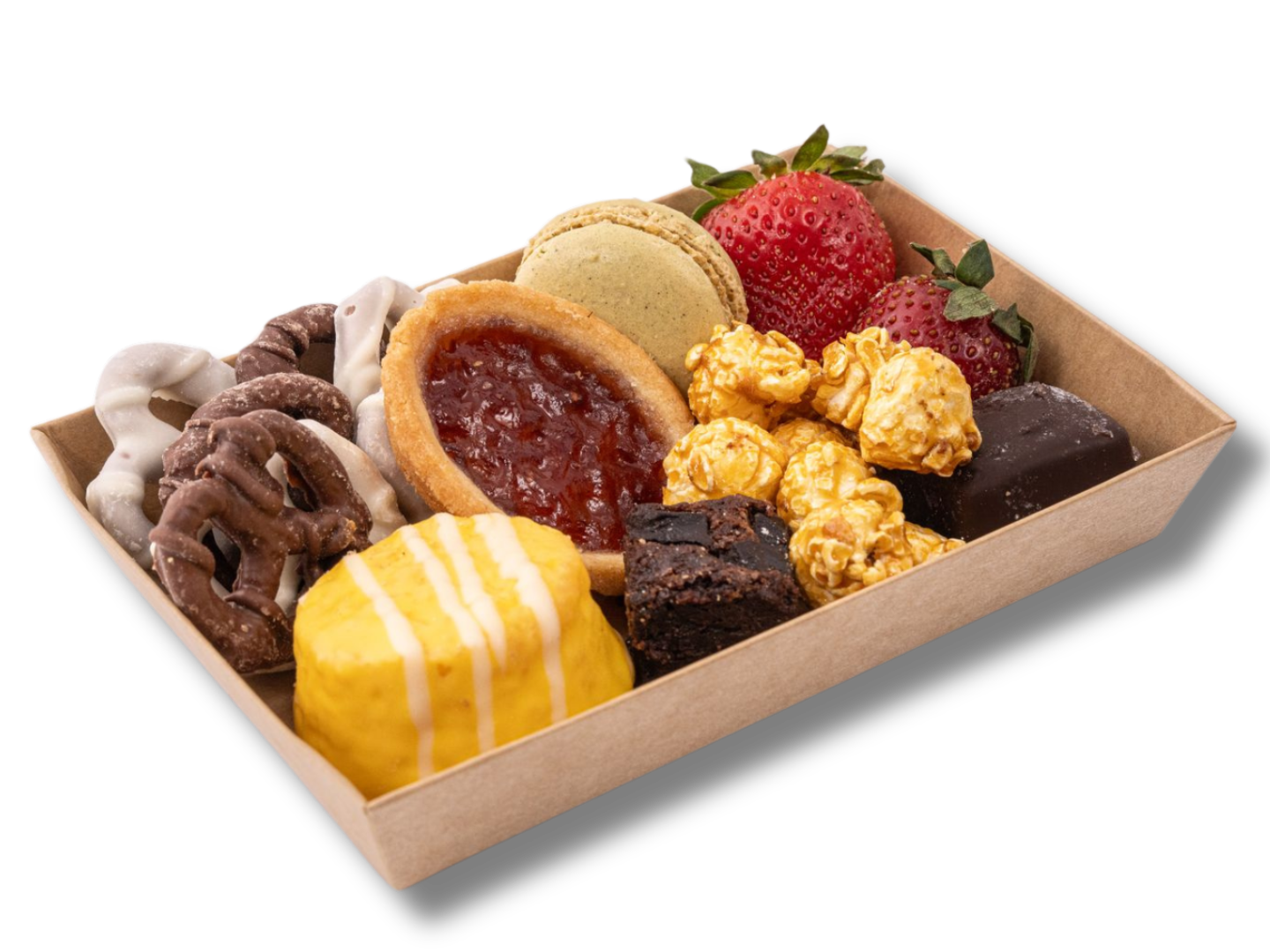 A tray filled with a variety of desserts and strawberries