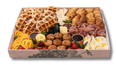 A box filled with a variety of food on a white background.