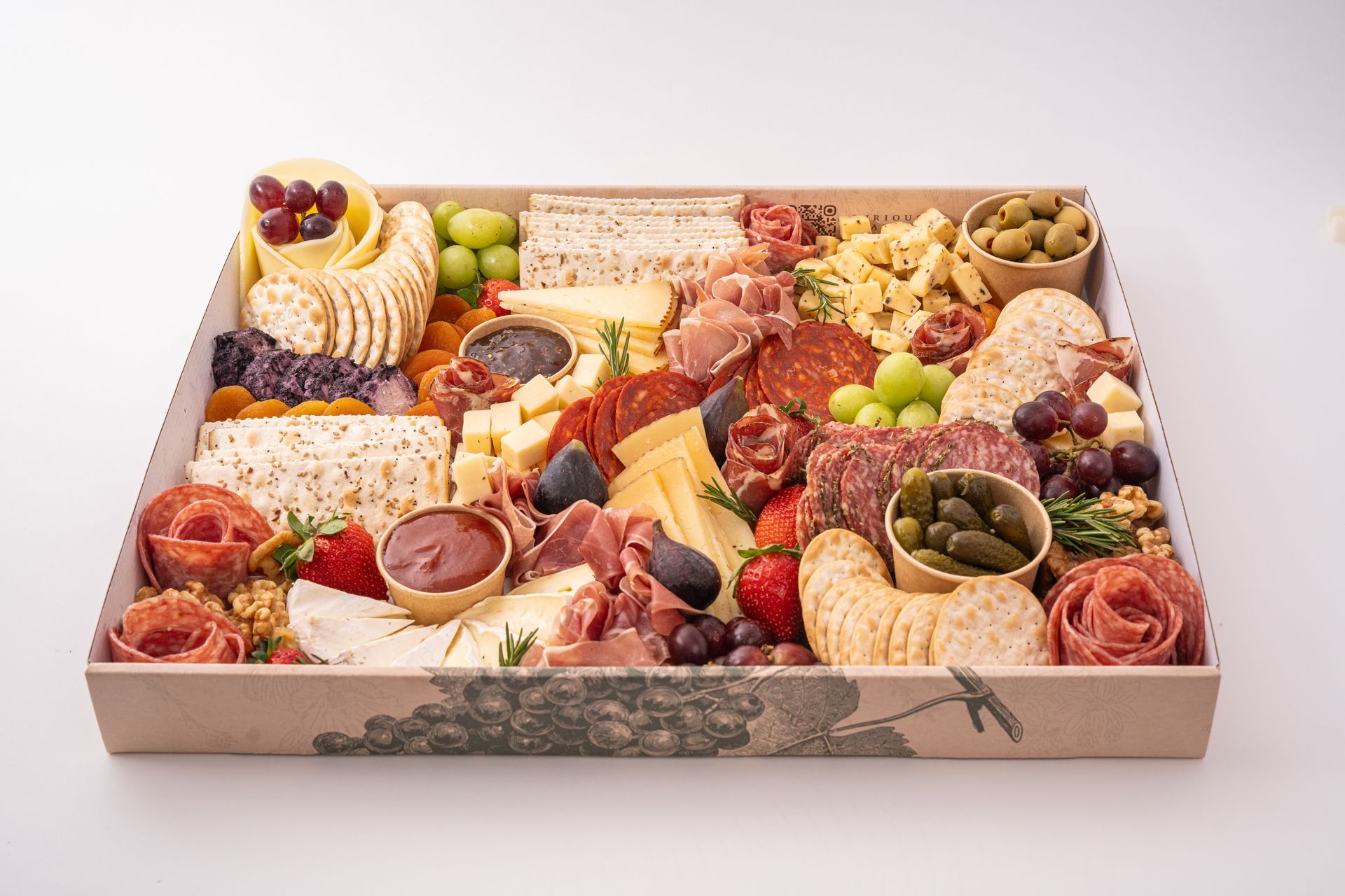 A large box filled with lots of different types of food.