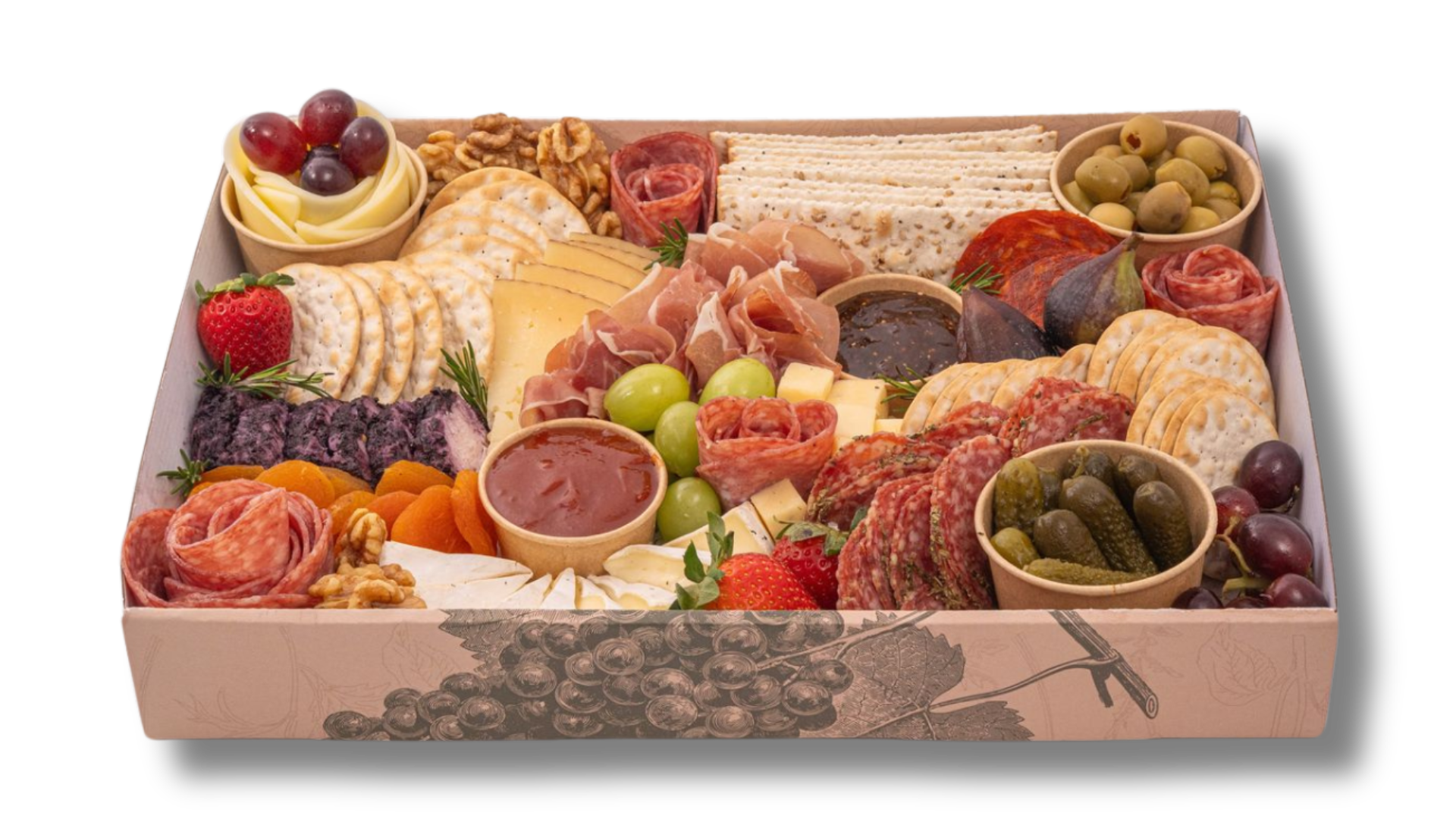A box filled with lots of different types of food on a white background.