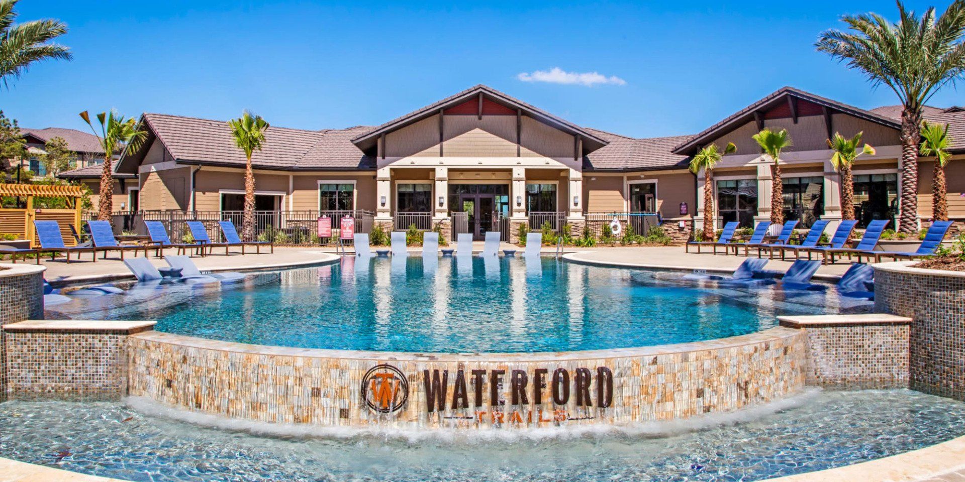 Pool view with Apartment Logo | Waterford Trails