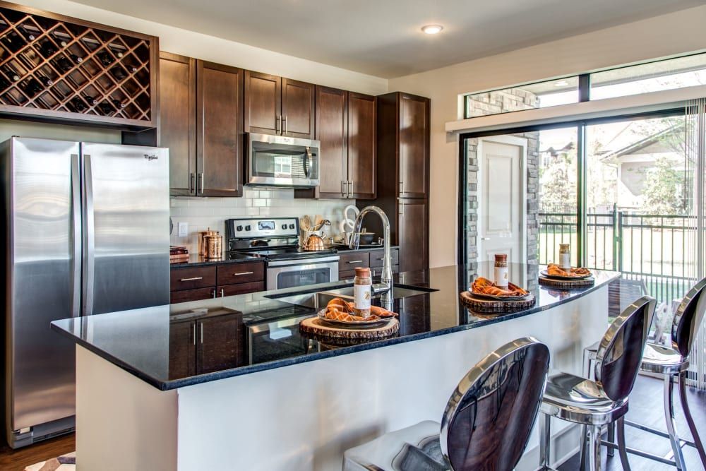 Equipped kitchen with breakfast bar | Waterford Trails