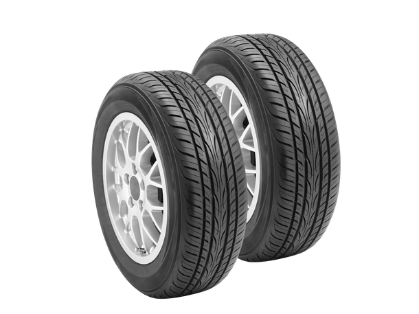 two black tires with silver rims on a white background