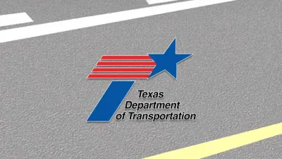 The texas department of transportation logo is on the road