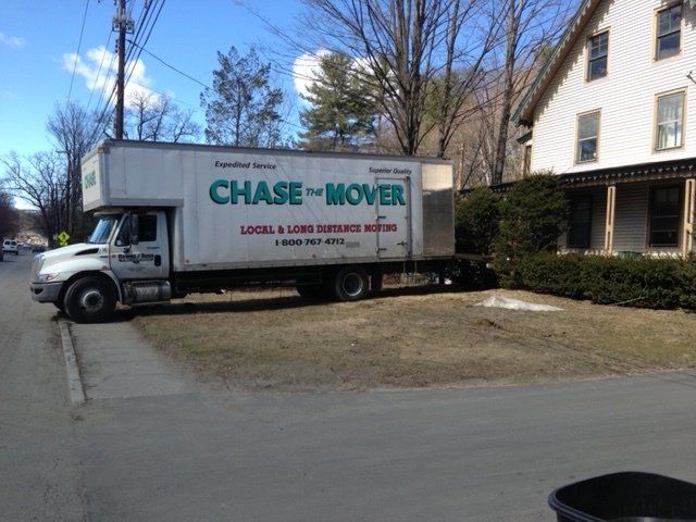 Mover holding clipboard - Movers in New York Awnings in Claremont, NH