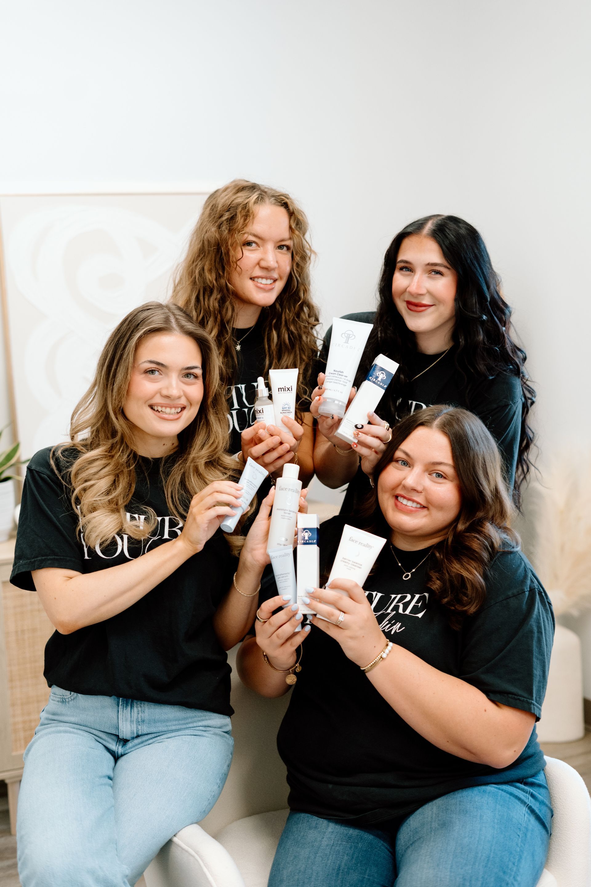 Future You Skin team of licensed estheticians standing together in the Gahanna, Ohio skincare clinic