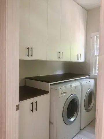 One popular request is to install a custom folding countertop over the washer and dryer.