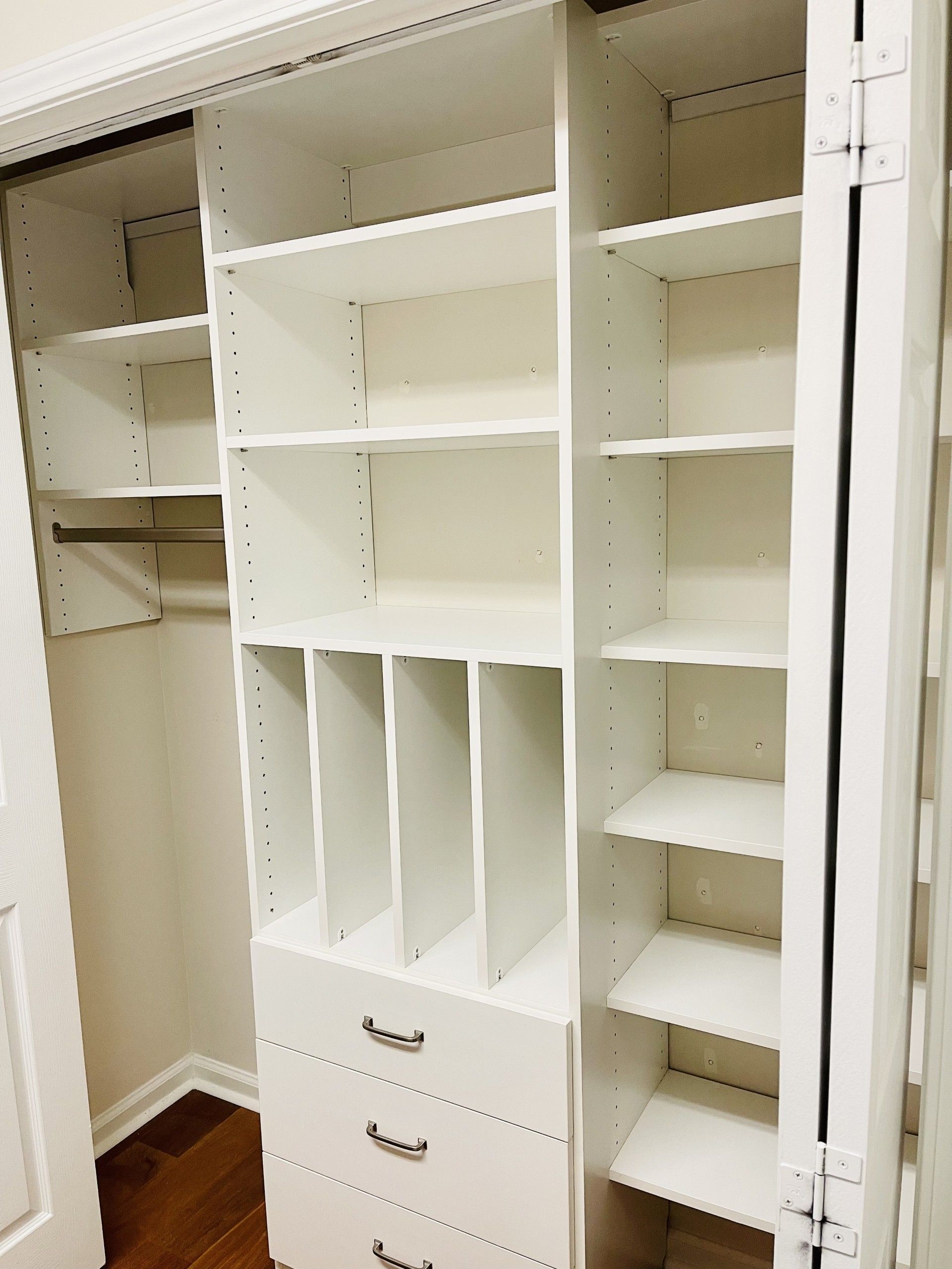 Vertical cubbies solve the age-old struggle of storing large sheet pans and trays.