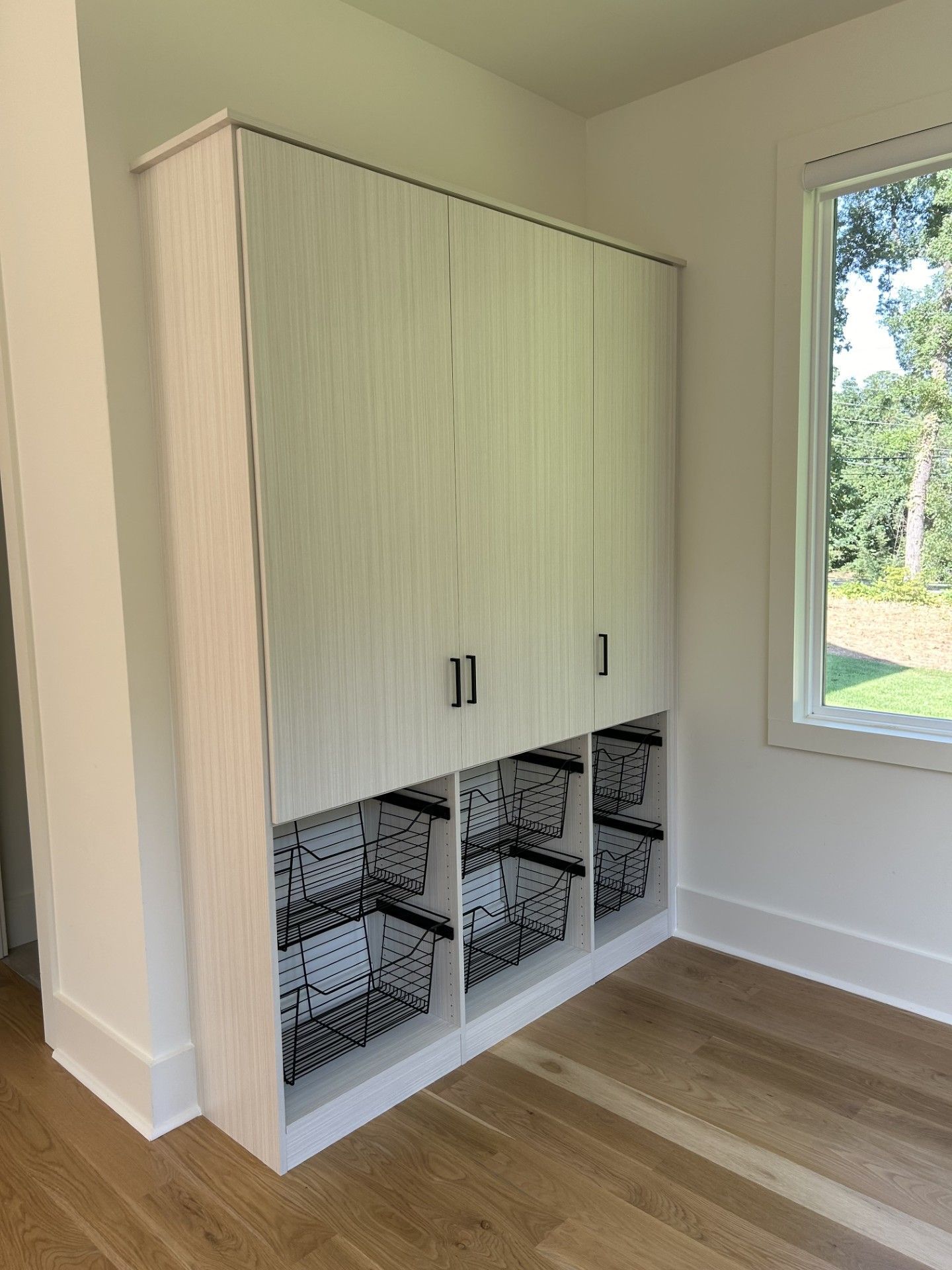 Closetopia creates custom solutions for mudrooms and laundry nooks, too!