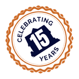 Celebrating 15 Years badge, featuring a blue shape of a building with 