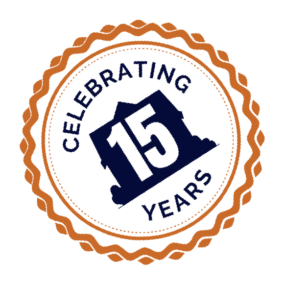 Celebrating 15 Years badge, featuring a blue house with the number 