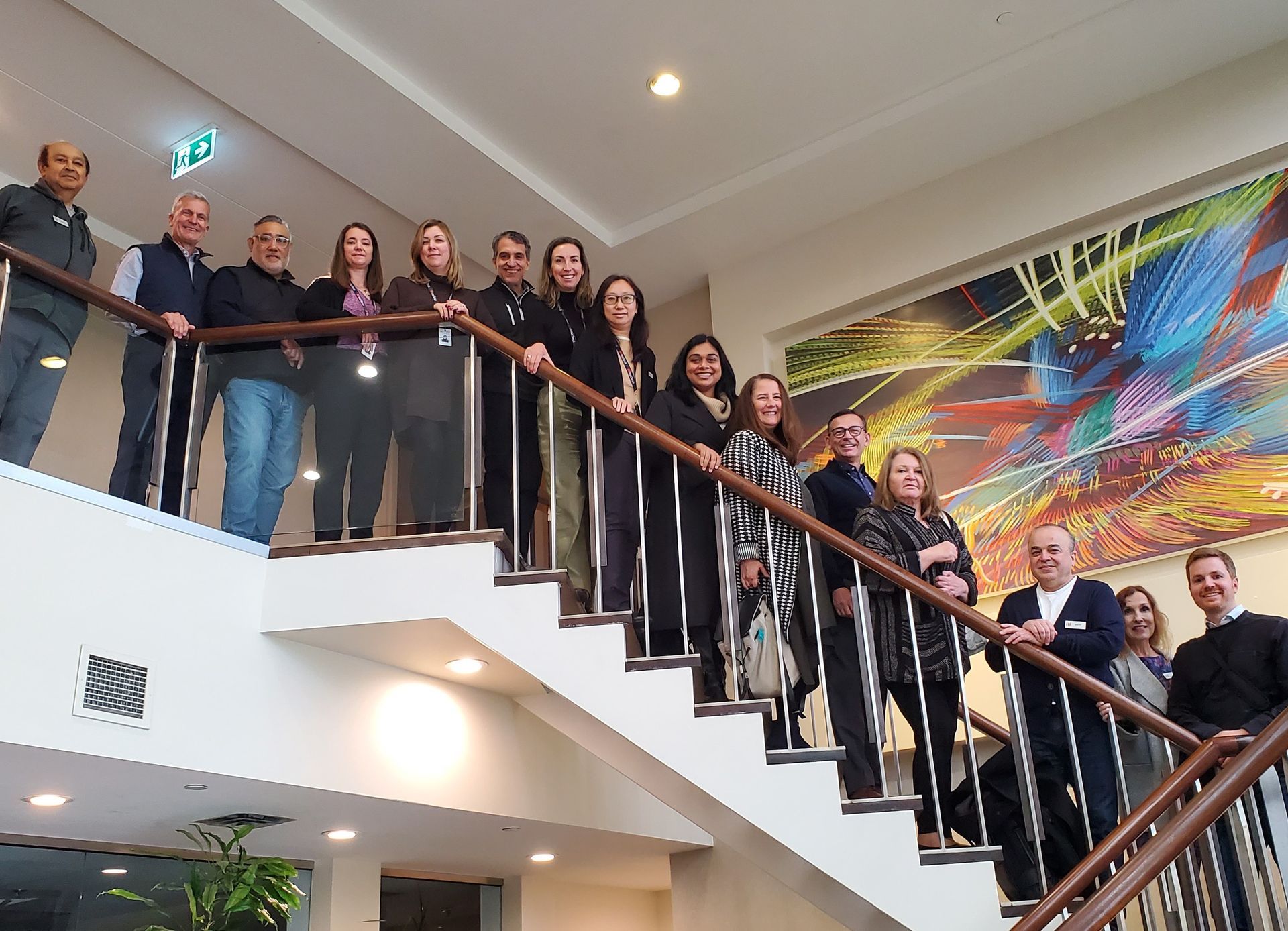 A group of people posing for a picture in a restaurant