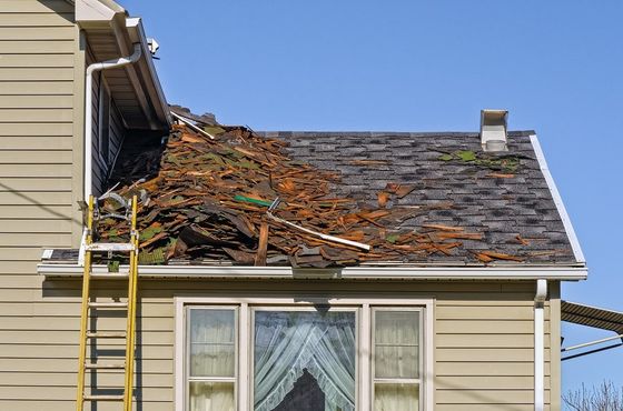 Tile Roofing ─ Old Roofing Being Removed  in Tucson, AZ