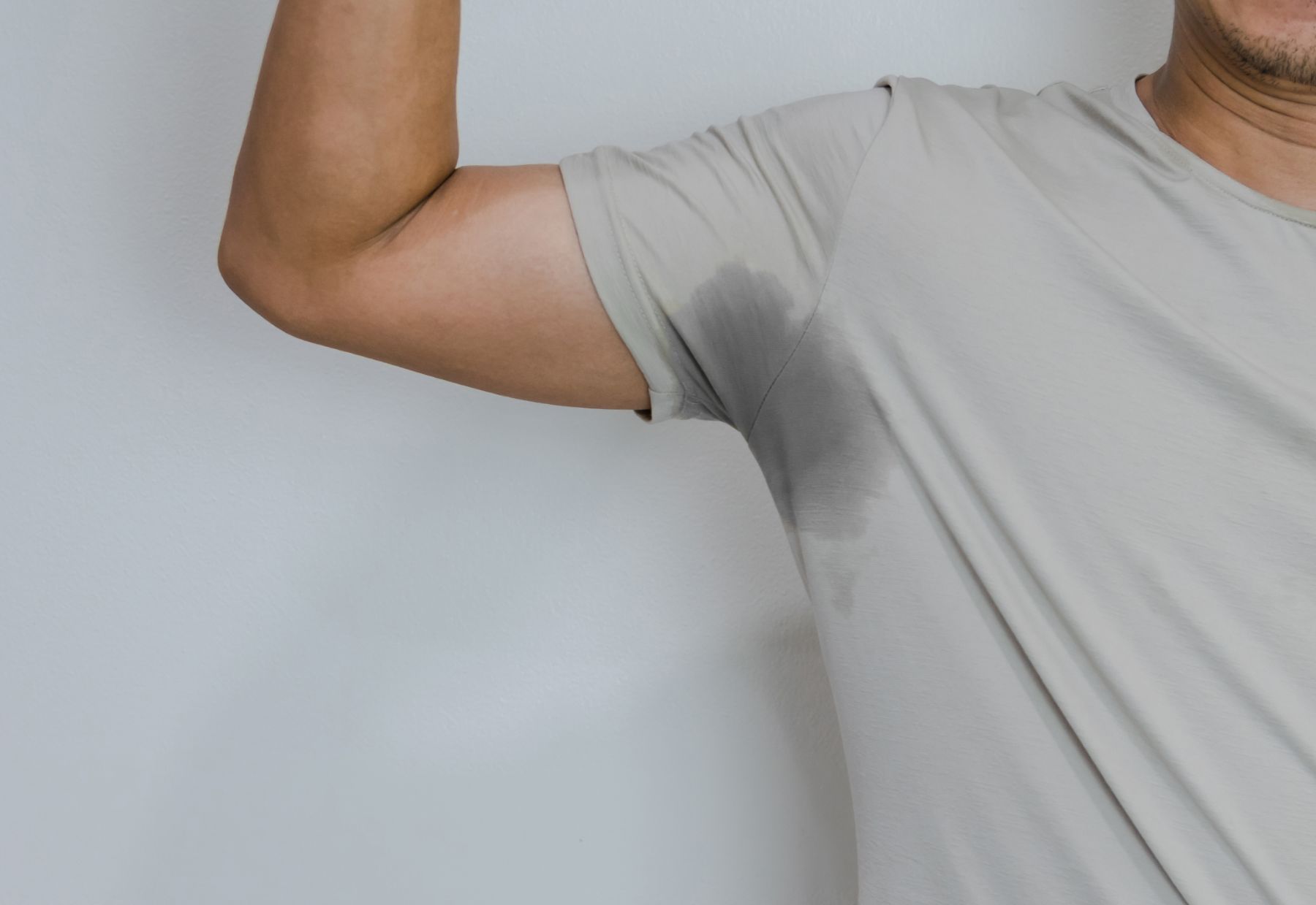 man with excessive underarm sweat