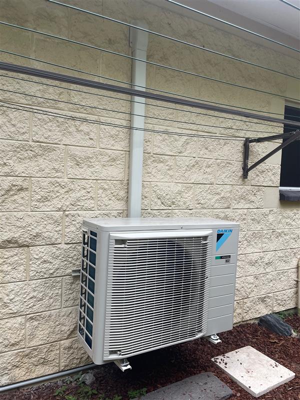 Outdoor air conditioning unit — Electrical Services in Tablelands, QLD
