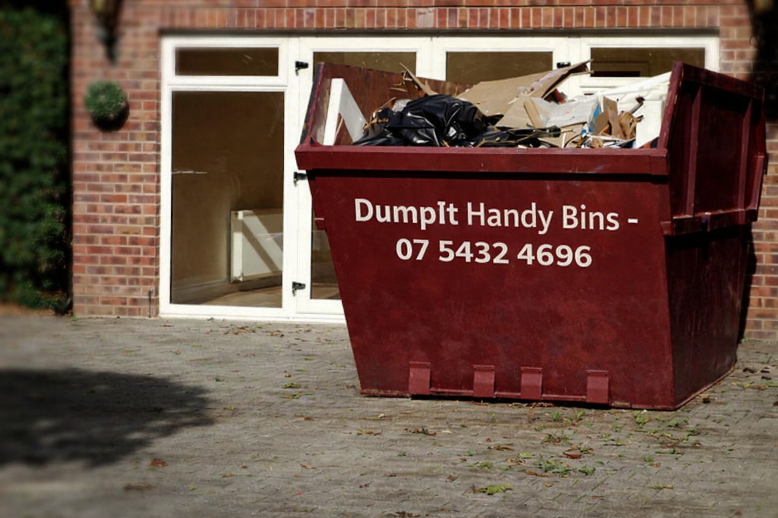 skip bins out the house ready for pick up after renovations