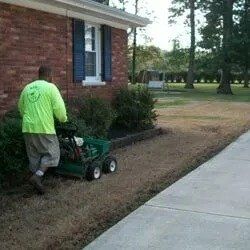 Man Mowing Lawn – Louisville, KY – Wayne's Lawn Service
