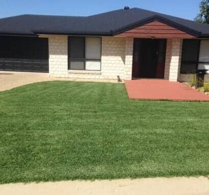 A House With A Lush Green Lawn In Front Of It — Barron River Lawns In Biboohra, QLD