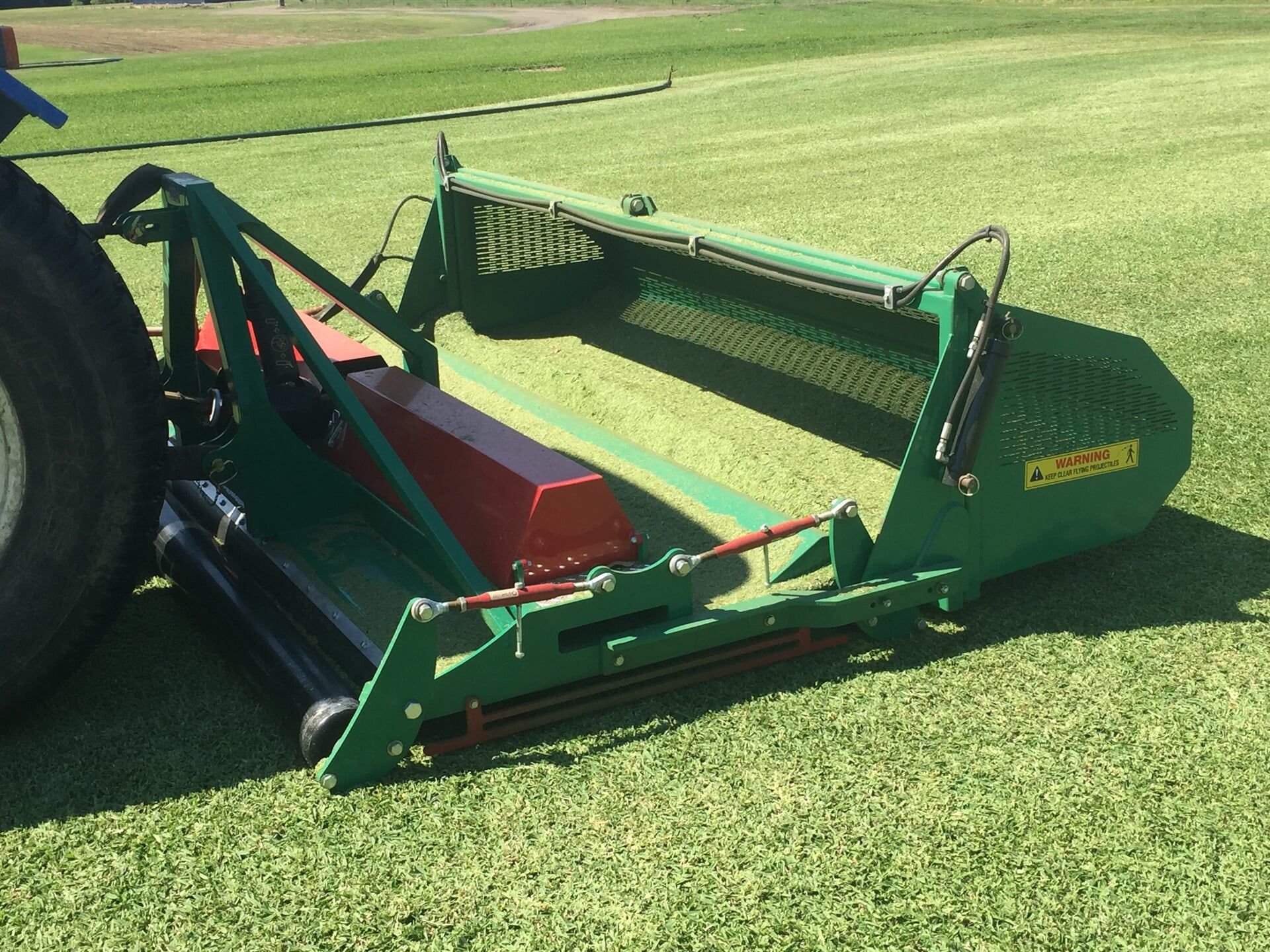 A Green Machine with the Word Chasers on it — Boambee Turf In Bonville, QLD