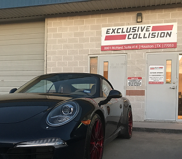 Black Porsche in Fron of Our Collistion Center in Houston, TX | Exclusive Collision and Customs