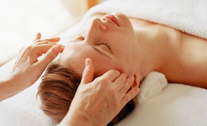 A lady having a head massage