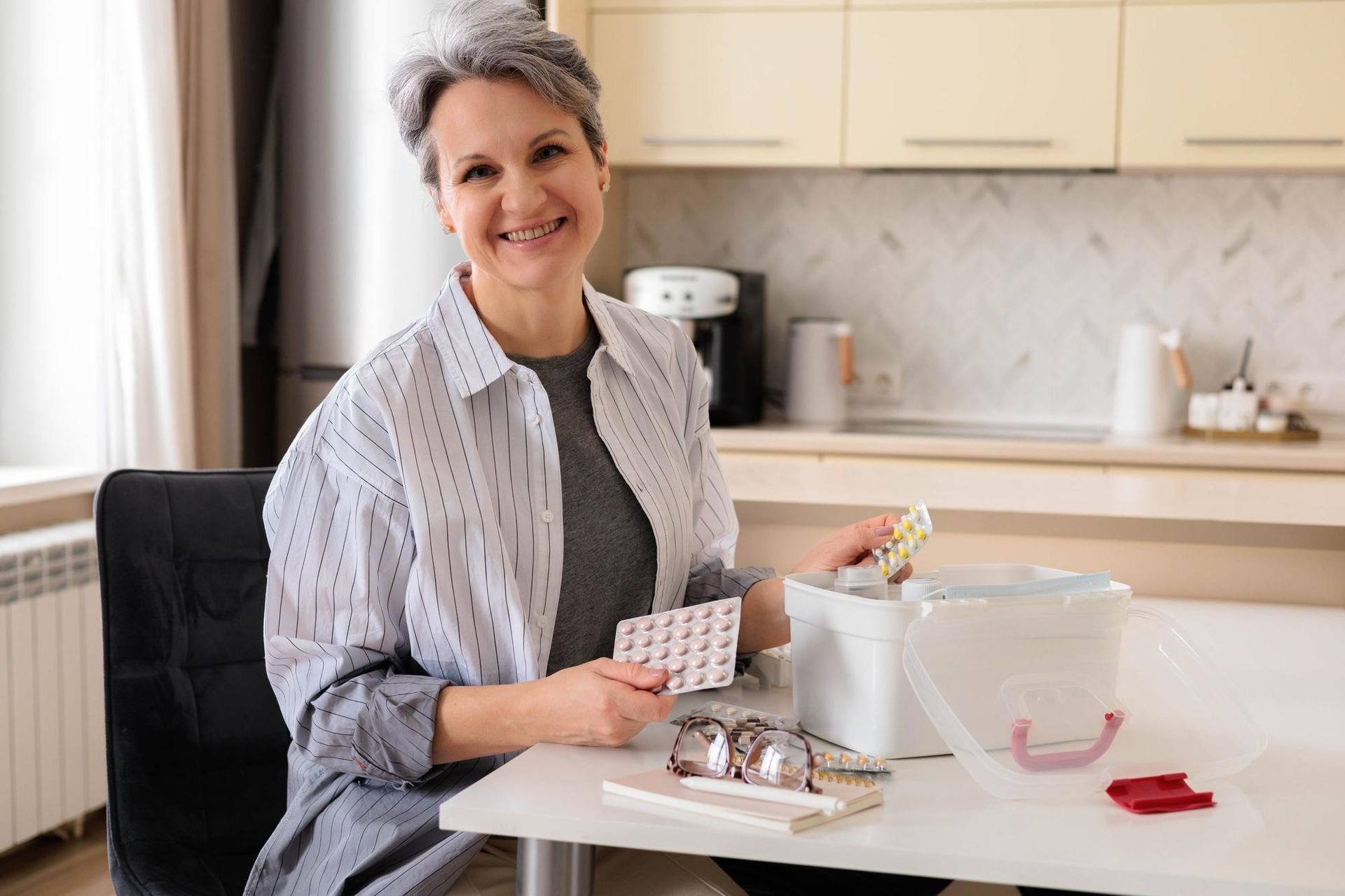 People enjoying a meal outdoors. Man grilling food, woman holding a glass. Sunlight illuminates the scene.
