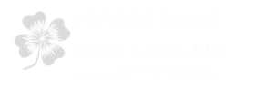 Logo featuring a four-leaf clover and text to its right, all in white.