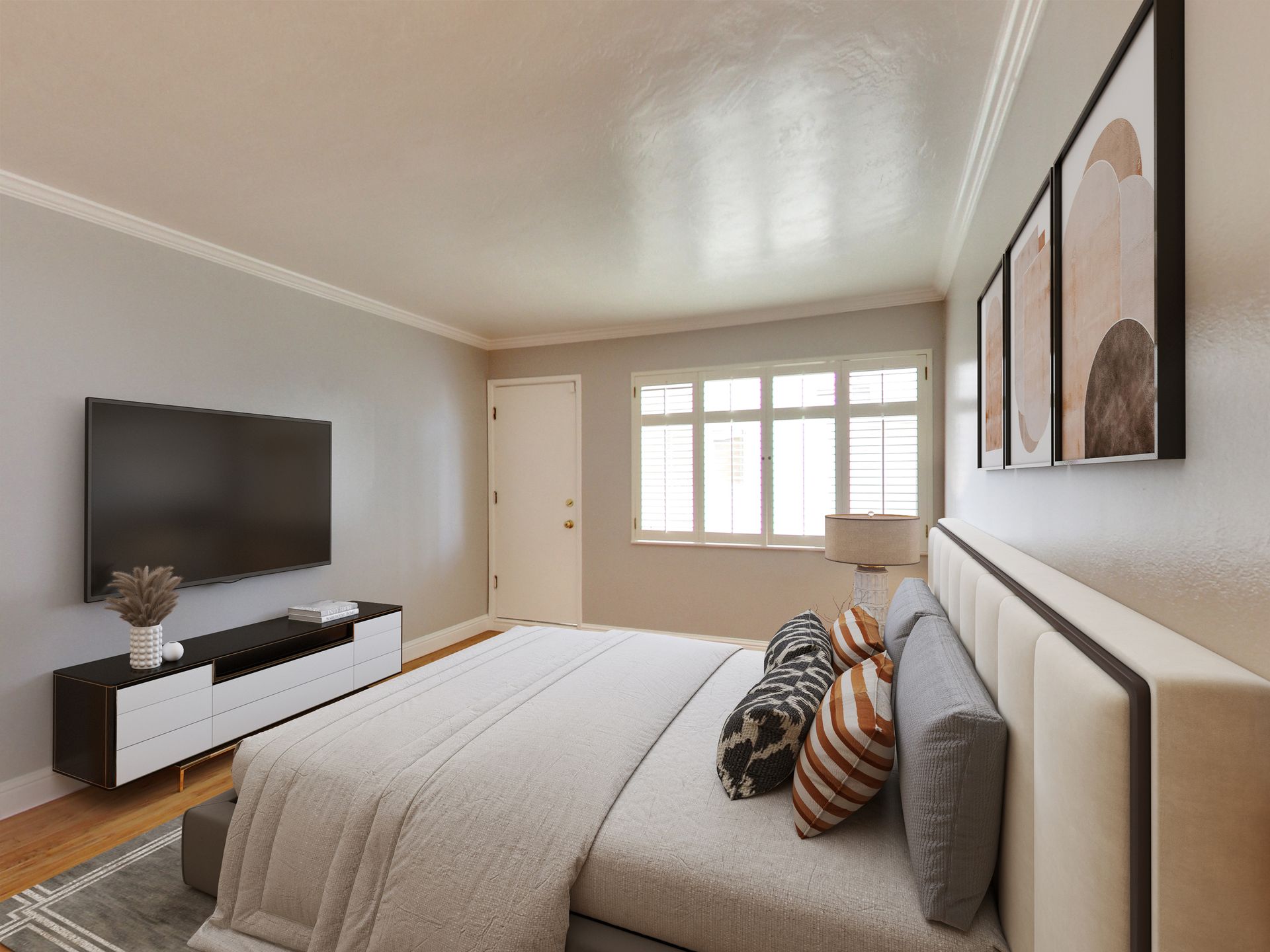 modern living room with a sofa, coffee table, bench, chair, tv and onlooking to a patio
