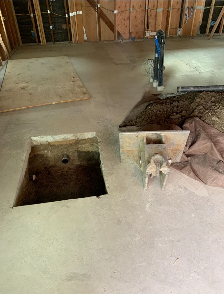 There is a hole in the floor in the middle of the room.