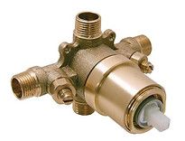 A close up of a brass valve on a white background.