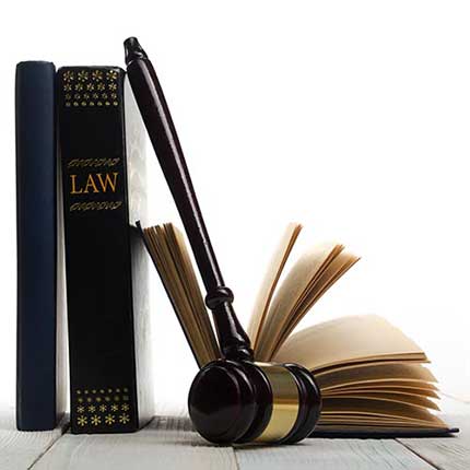 Open law book with wooden judges gavel - Law Firm in York, PA