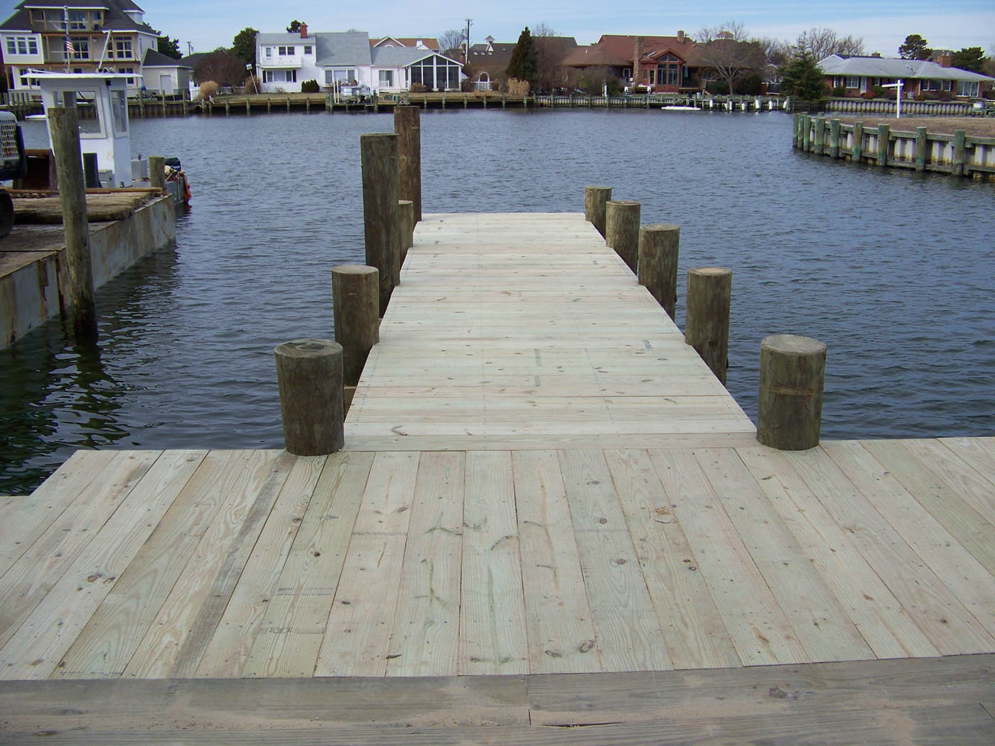Boat dock with slips on each side