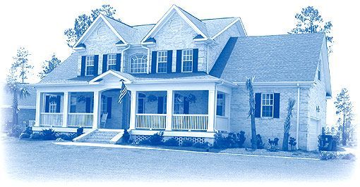 A blue and white photo of a house with a large porch