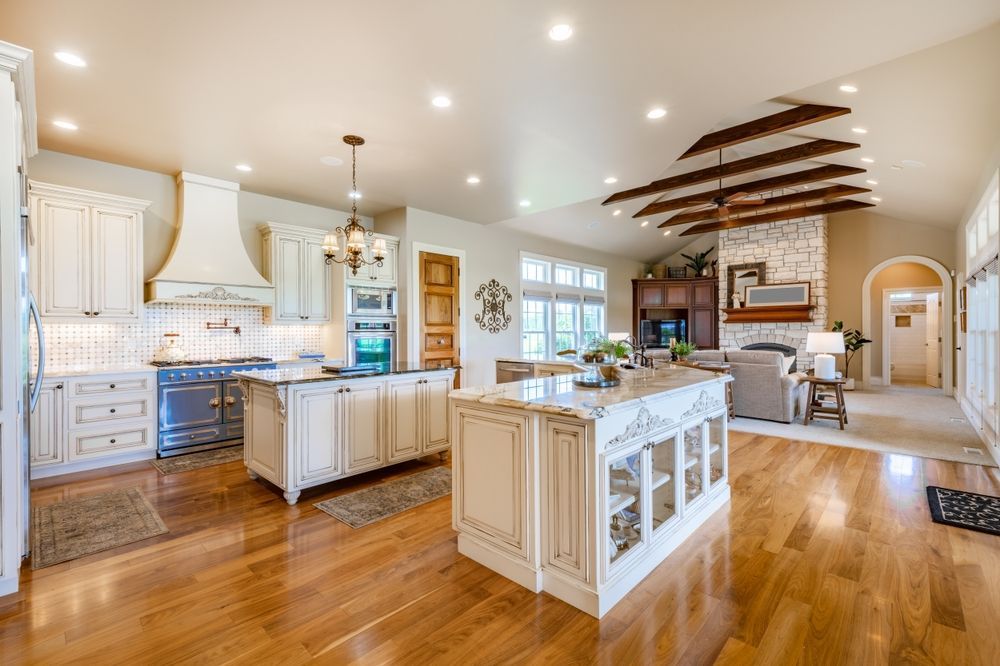 There is a large island in the middle of the kitchen.