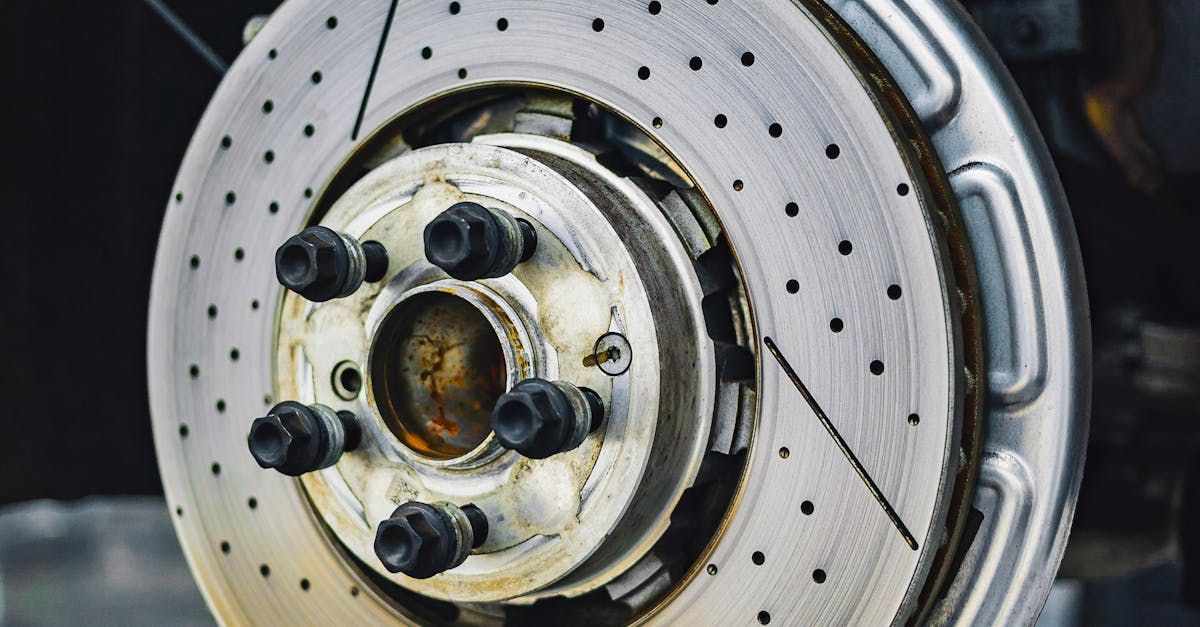 A close up of a brake disc on a car.| J. Benak Service Inc.