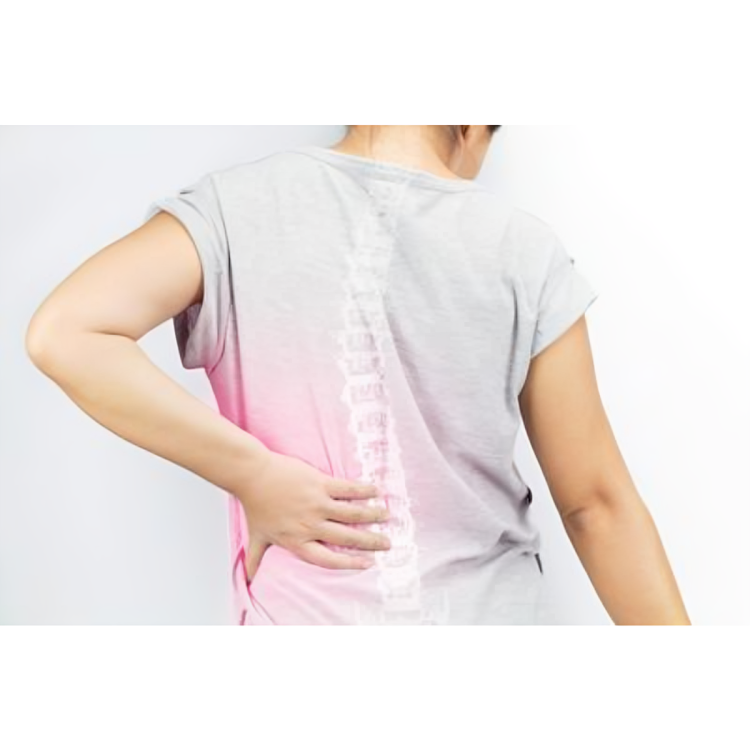 A woman is holding her back in pain with a spine visible behind her.