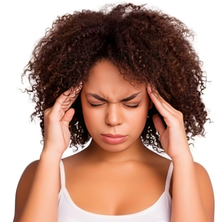 A woman with curly hair is holding her head in pain