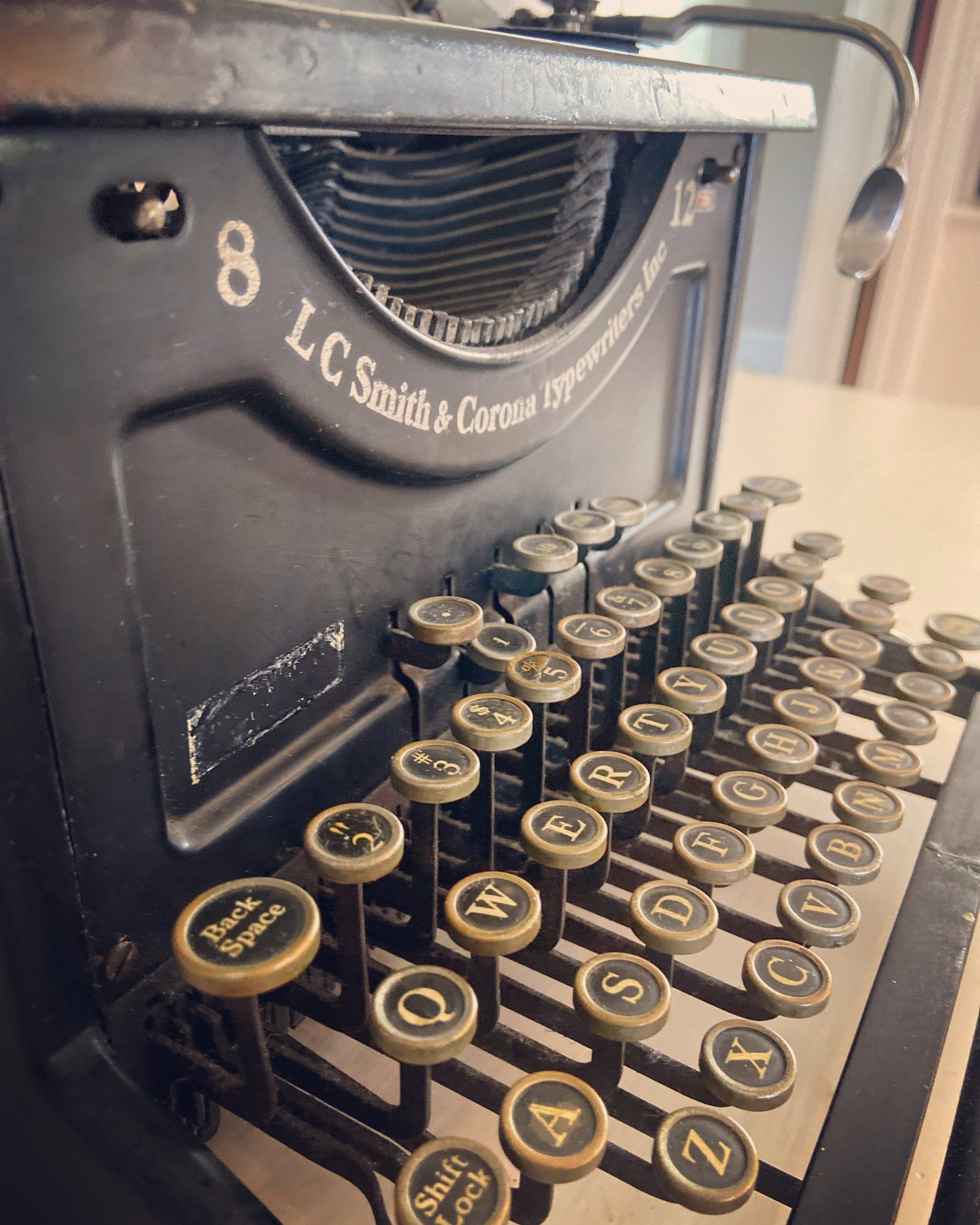 An old typewriter with the number 8 on it