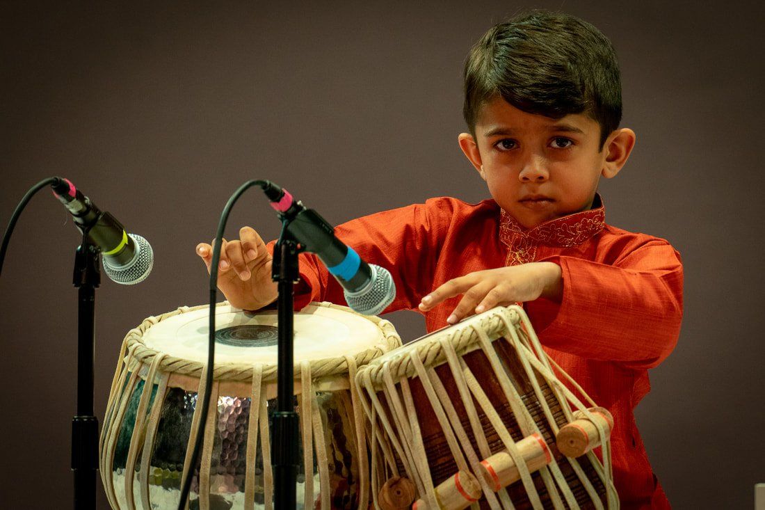 Indian School – Little Boy Playing Drums in Rutherford, NJ