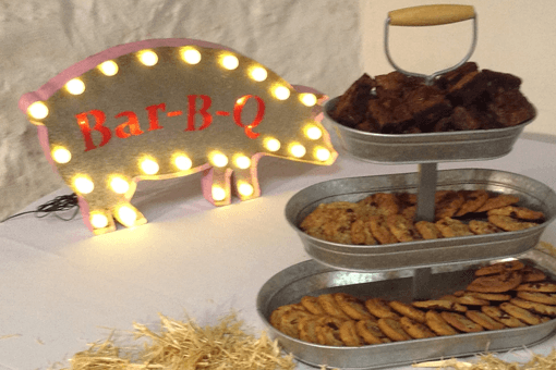 A table with a sign that says bar-b-q on it