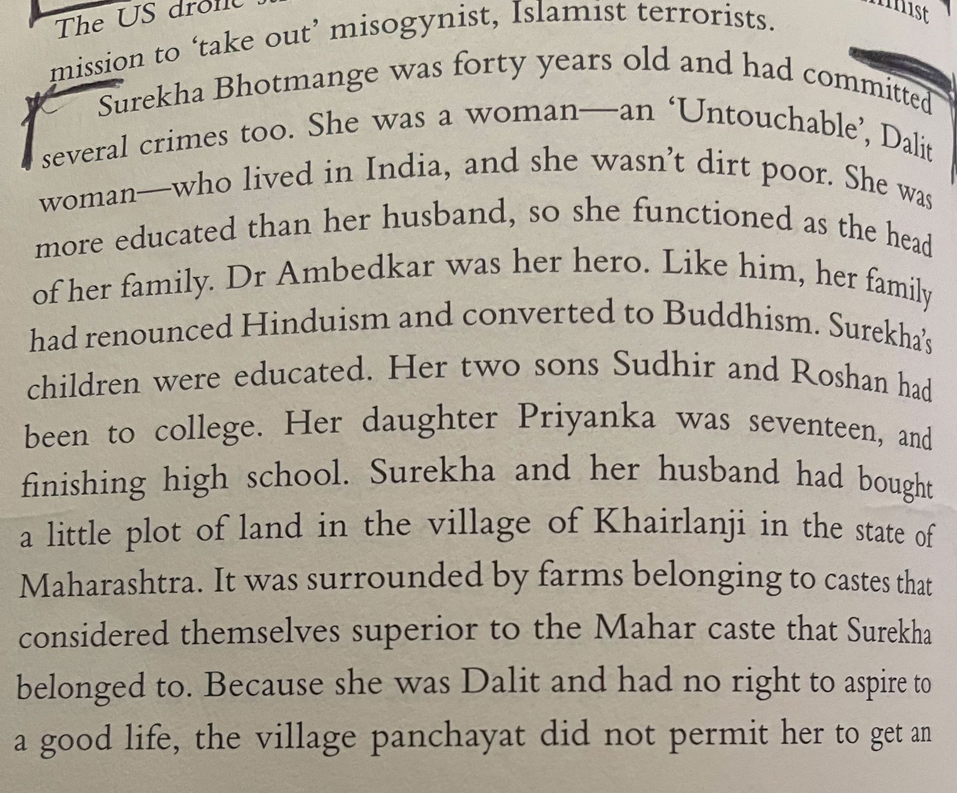 A book is open to a page about a woman