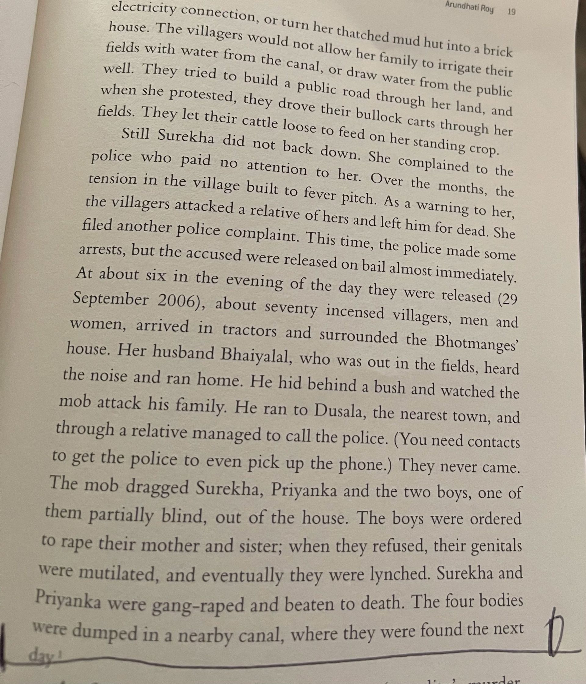 A book is open to a page with a lot of writing on it