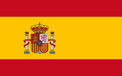 The flag of spain has a coat of arms on it.