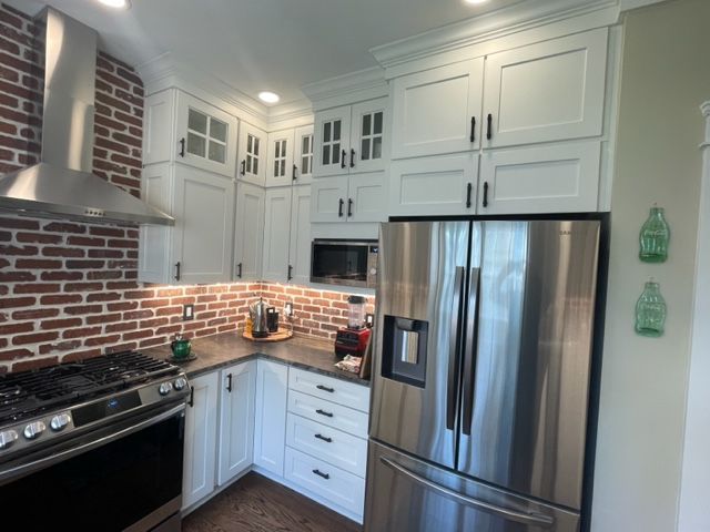 Tiling Backsplash with Lightning and Refrigerator — Virginia Beach, VA — Harbour View Kitchen, Bath, & Flooring