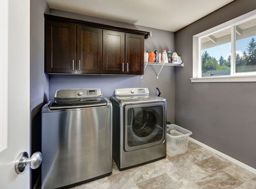 Interior Remodeling — Grey Laundry Room with Modern Appliances in Hillsborough, NJ