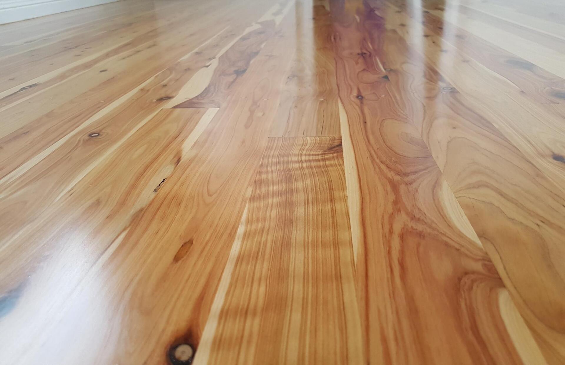 Polished Wooden Floor — Floor Sanding, Installation And Restoration in Hervey, QLD