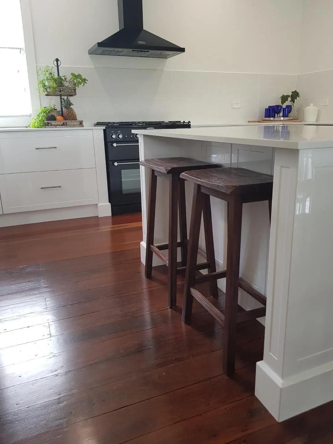 A Kitchen with Stools and A Stove in It — Smith's Joinery in Nimbin, NSW
