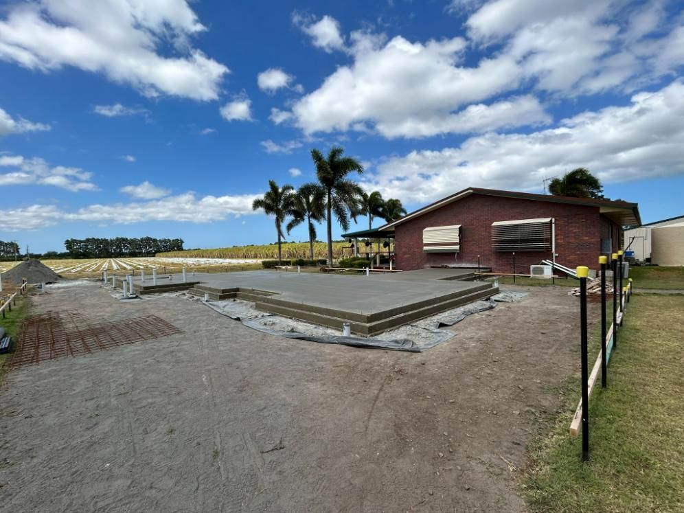 A House Is Being Built in The Middle of A Field — Formosa Building And Renovations in Baffle Creek, QLD