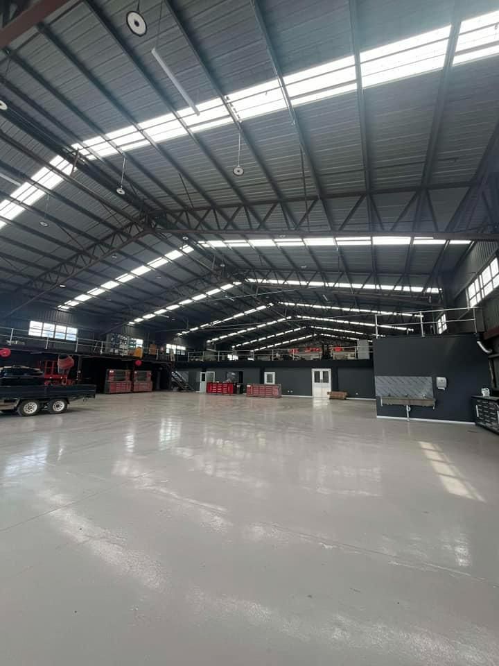 A Large Warehouse with A Lot of Windows — Formosa Building And Renovations in Woodgate, QLD